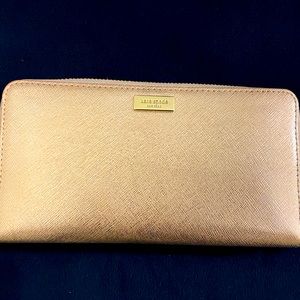 Kate Spade rose gold leather wallet